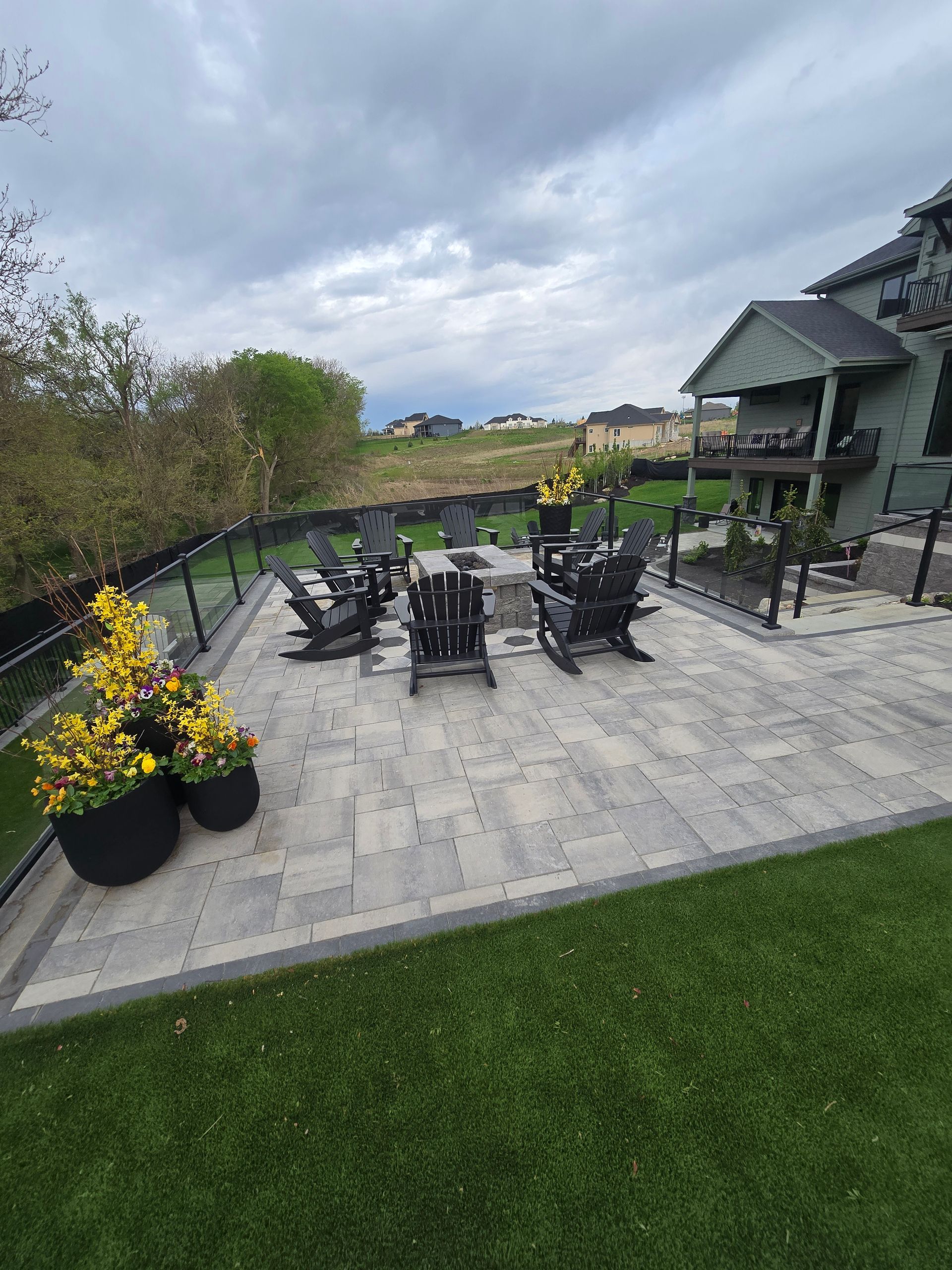 Hardscape Contractor Omaha NE patio walkway retaining wall project by Garret's Lawn Services
