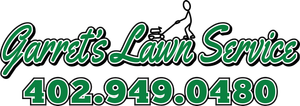 The logo for garrett 's lawn service shows a person holding a lawn mower.