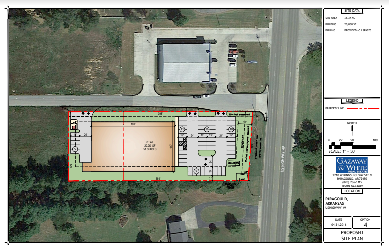 Aerial site plan over a building footprint, parking, and landscape design on a property parcel