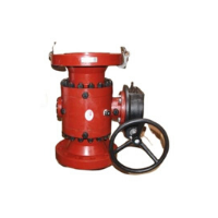 Red industrial valve with black hand wheel on a white background