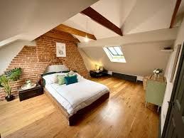 Best Suffolk loft conversion for luxury bedroom by Pro Build East Ltd with sky lights giving natural light