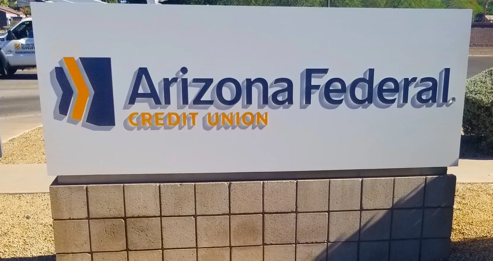 A sign for the arizona federal credit union