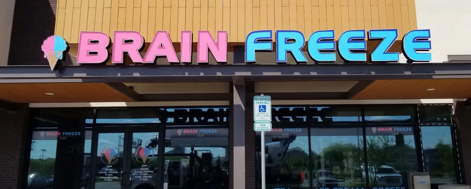 A store front with a sign that says brain freeze