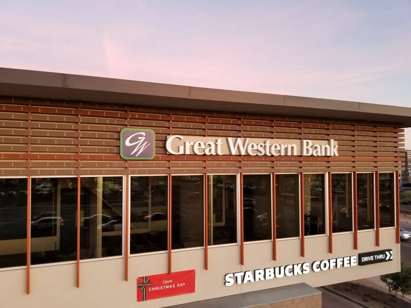 A building with a sign that says great western bank
