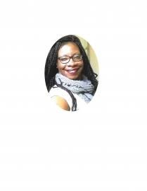 Smiling person with glasses and scarf in an oval portrait against a white background
