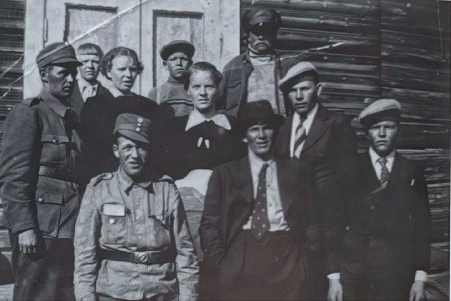 Historic group portrait of Arctic GM family and community members in period clothing