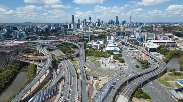 An aerial view of a city with a lot of highways going through it.
