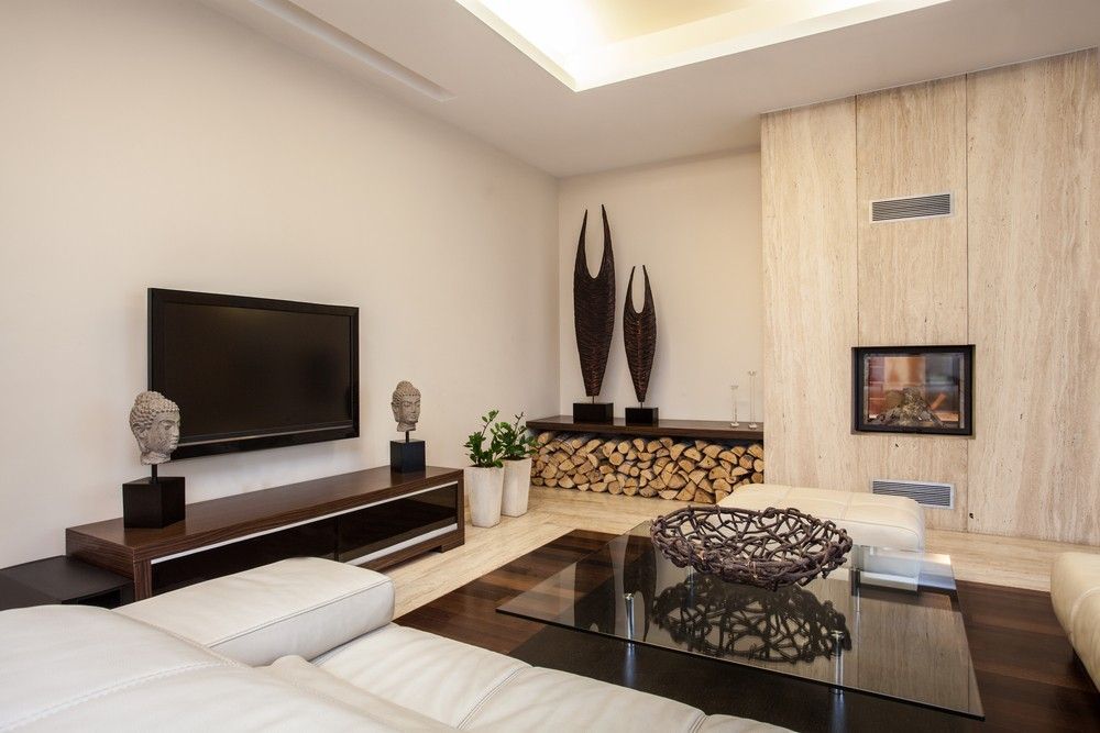 A Living Room With A Flat Screen Tv And A Fireplace — Canberra Handyman Solutions In Wanniassa, ACT