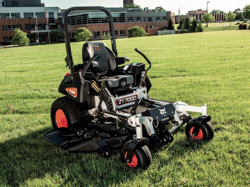 A Lawn Mower Is Sitting on Top of A Lush Green Field — Stihl Shop Grafton in Yamba, NSW