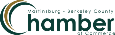 The logo for the Martinsburg-Berkeley County Chamber of Commerce, featuring stylized curved lines next to the text.