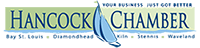 A logo for the hancock chamber with a sailboat on it