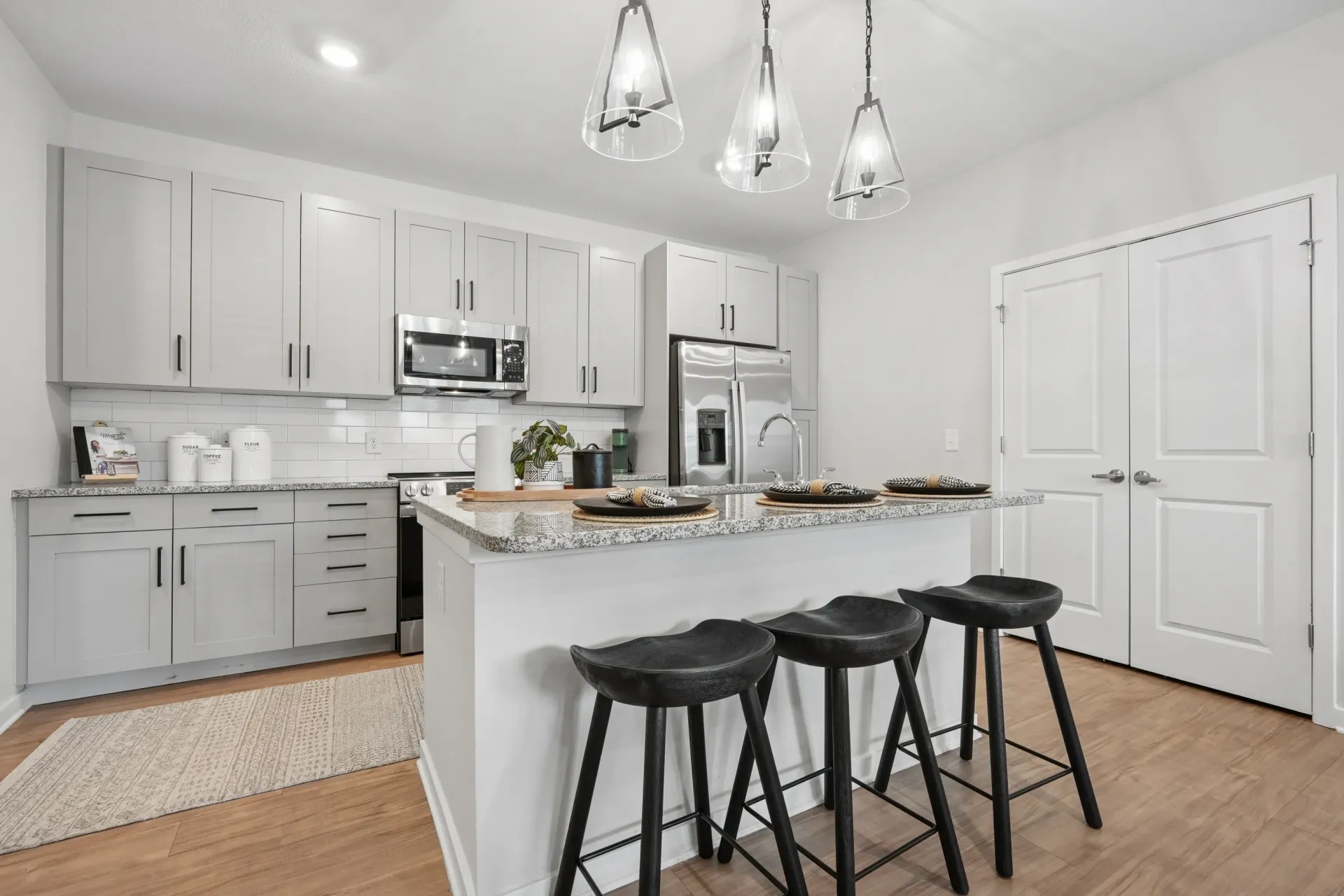 Modern kitchen with island and bar stools