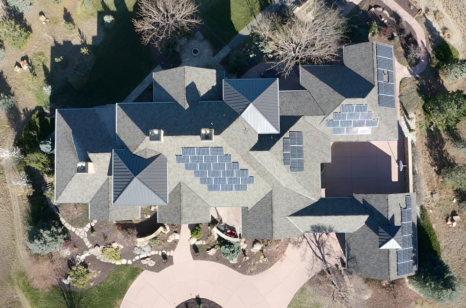 Residential asphalt shingle roof and solar panel installation in Boulder, CO