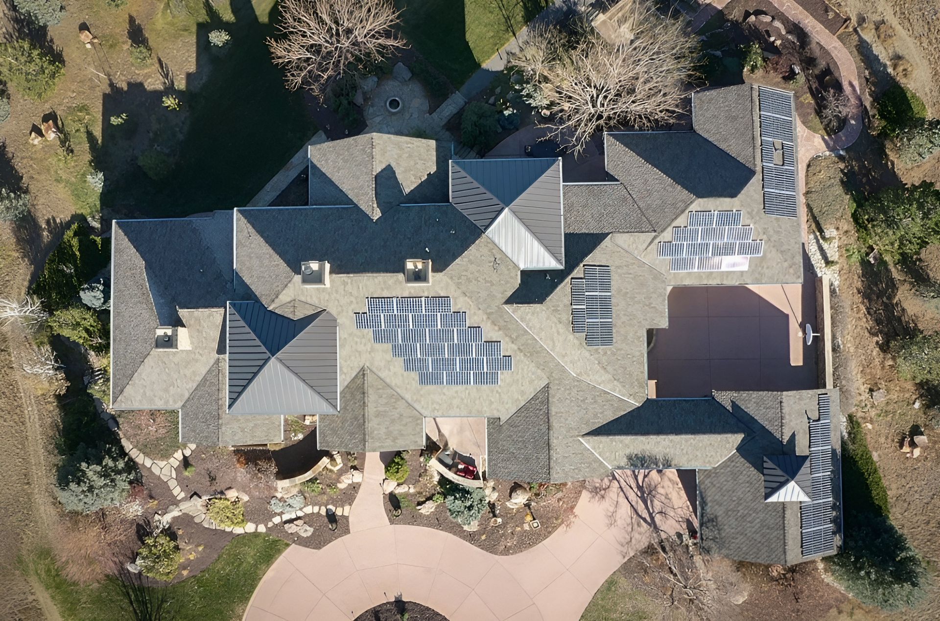 Residential asphalt shingle roof and solar panel installation in Boulder, CO