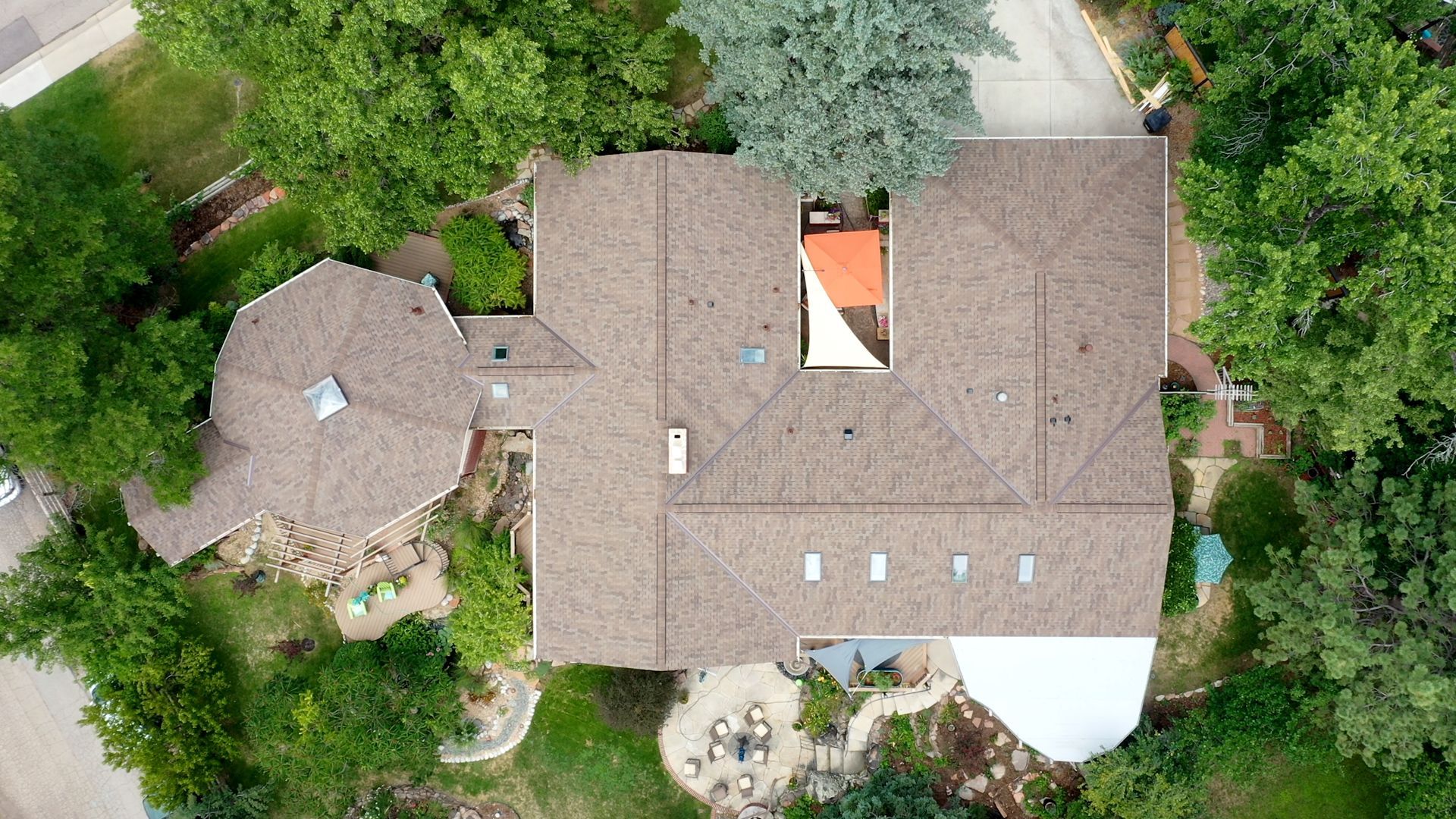 Residential asphalt roof replacement in Longmont, CO by CCG Roofing & Project Management