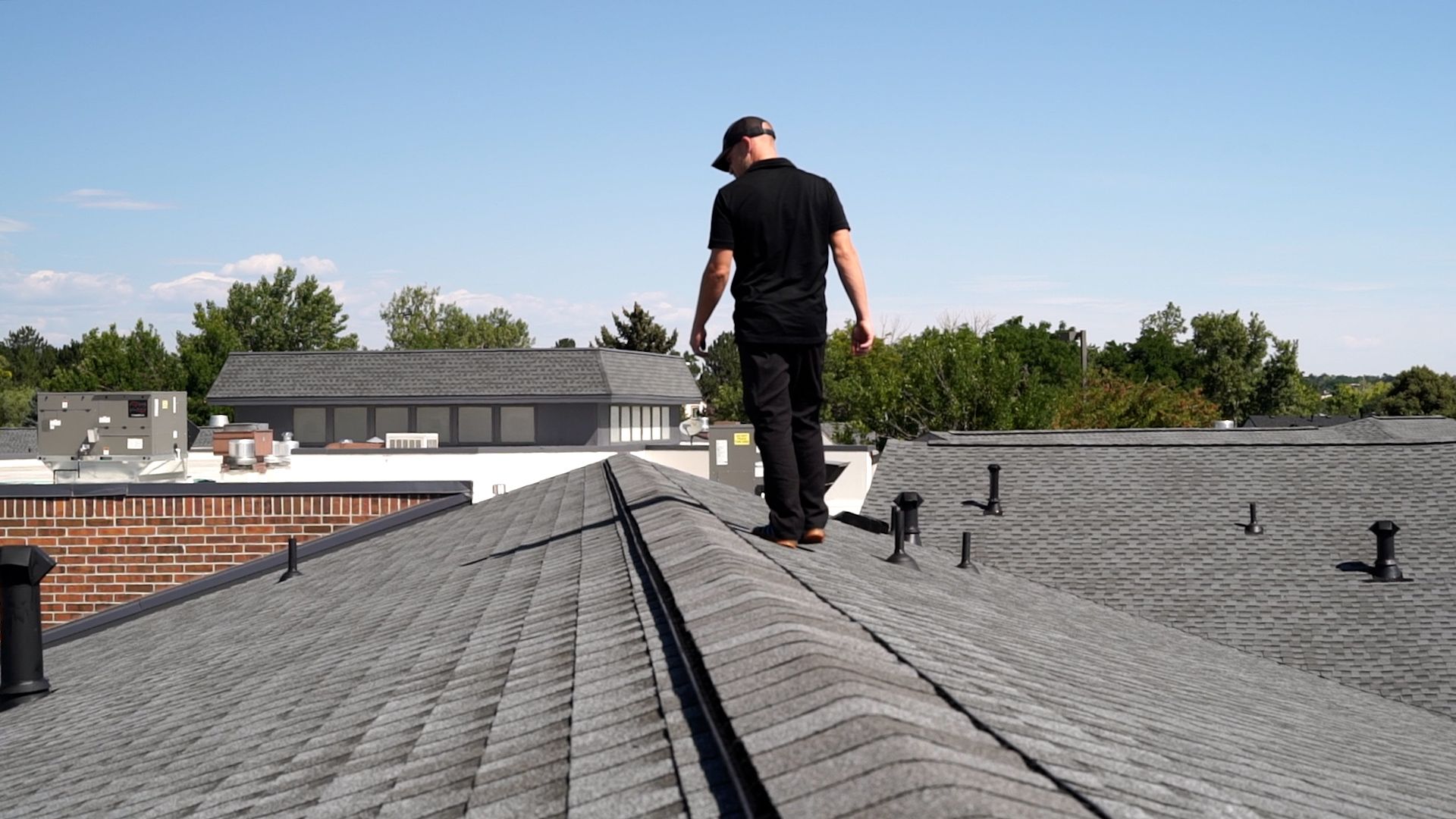 Residential roof inspection by a CCG Roofing team member in Boulder, CO