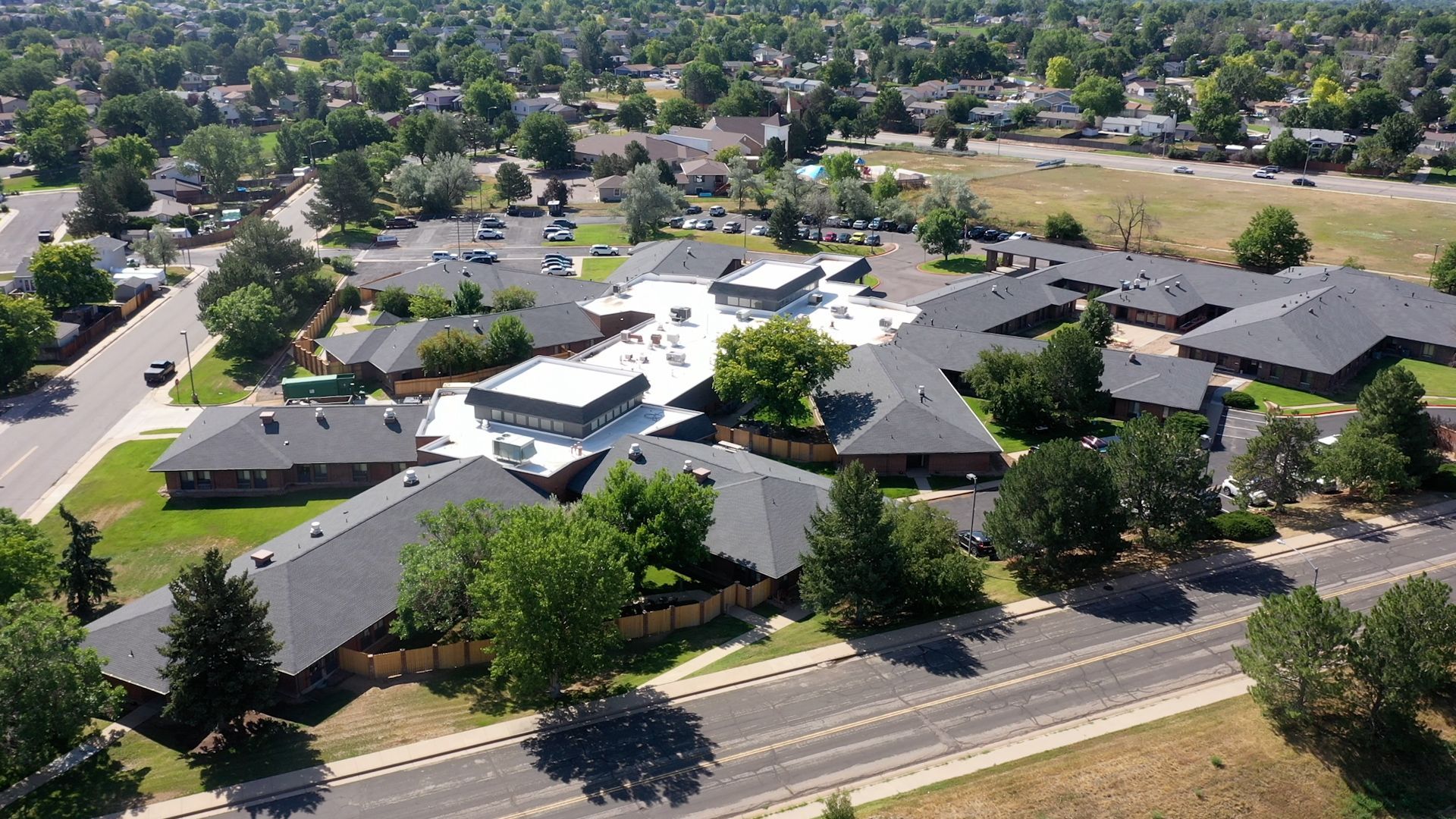 Aerial view of multiple residential roof installations in Boulder, CO