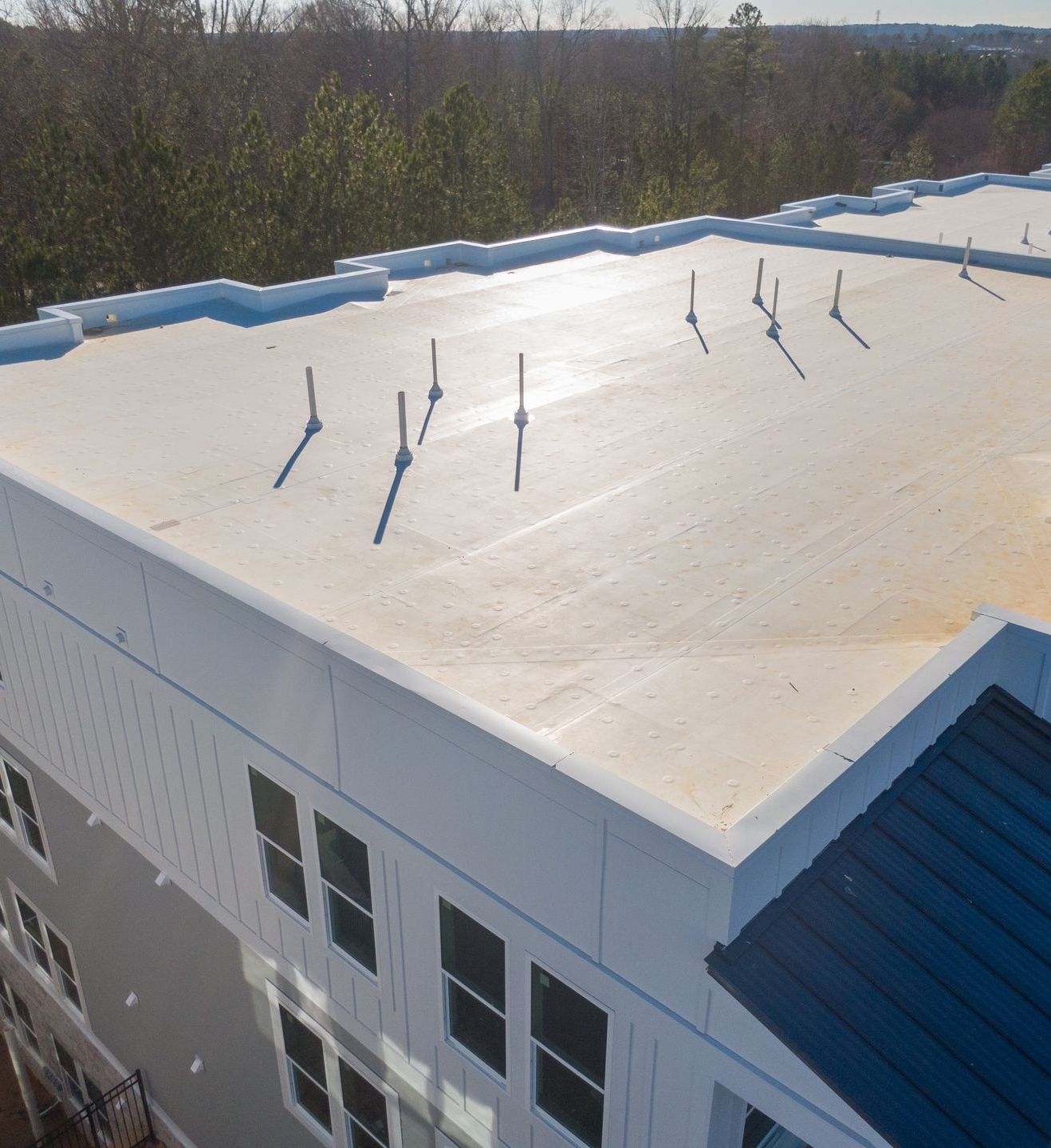 Aerial view of a commercial PVC roof installation in Boulder, CO