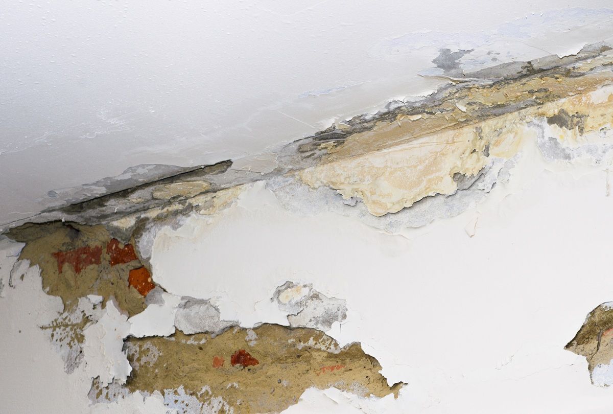 Ceiling drywall showing visible deterioration and staining