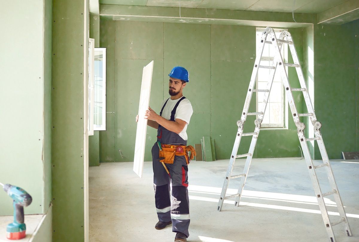 Drywall professionals working on a residential interior project