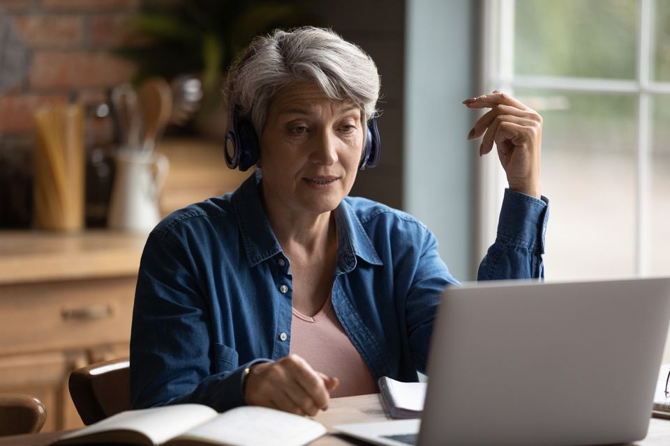 older person talking on the phone to a therapist