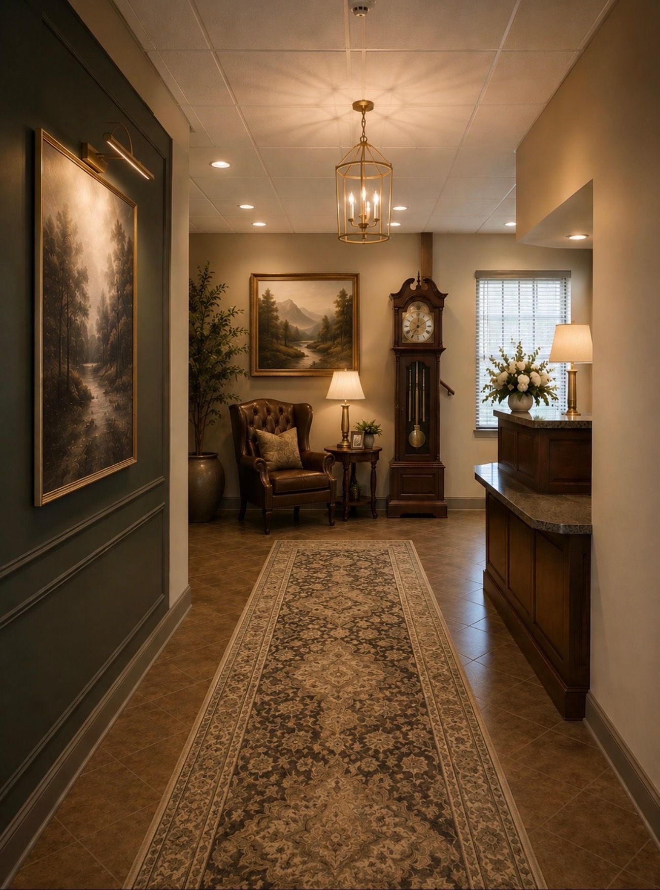 Elegant hallway with warm lighting, ornate rug, framed art, a chair, clock, and a wooden console table