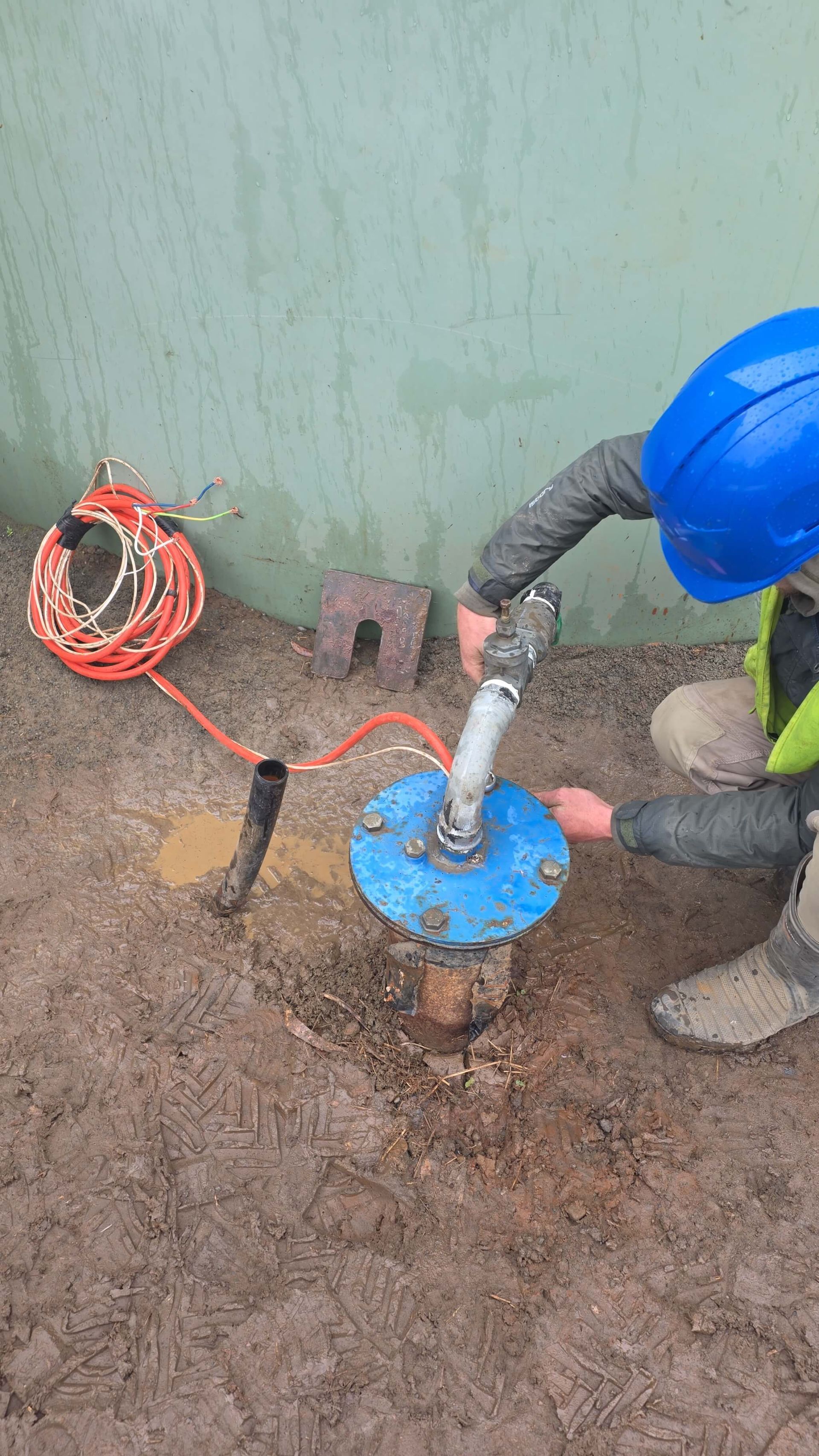 Water and electrical service technician at work