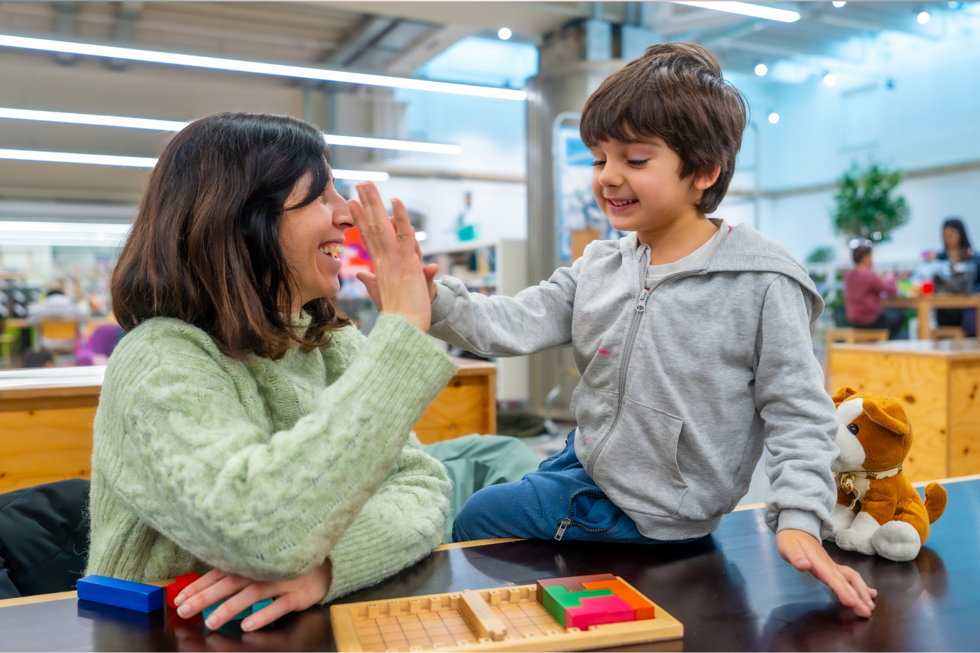 Young kid enjoys learning at school after completing mandatory vaccines for school during summertime.