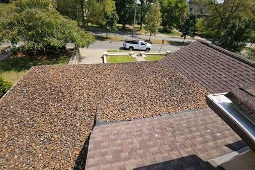 Ballasted EPDM flat roof system with rocks
