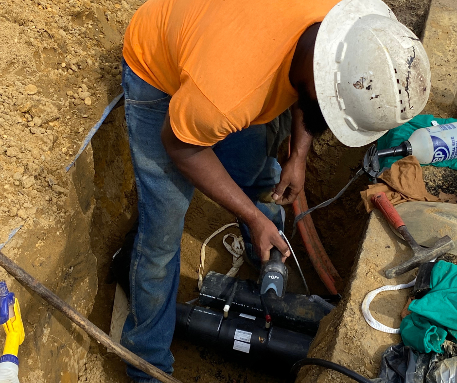 Fusing pipes together to run communication lines.