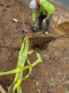 A locate hole for an electric service project.