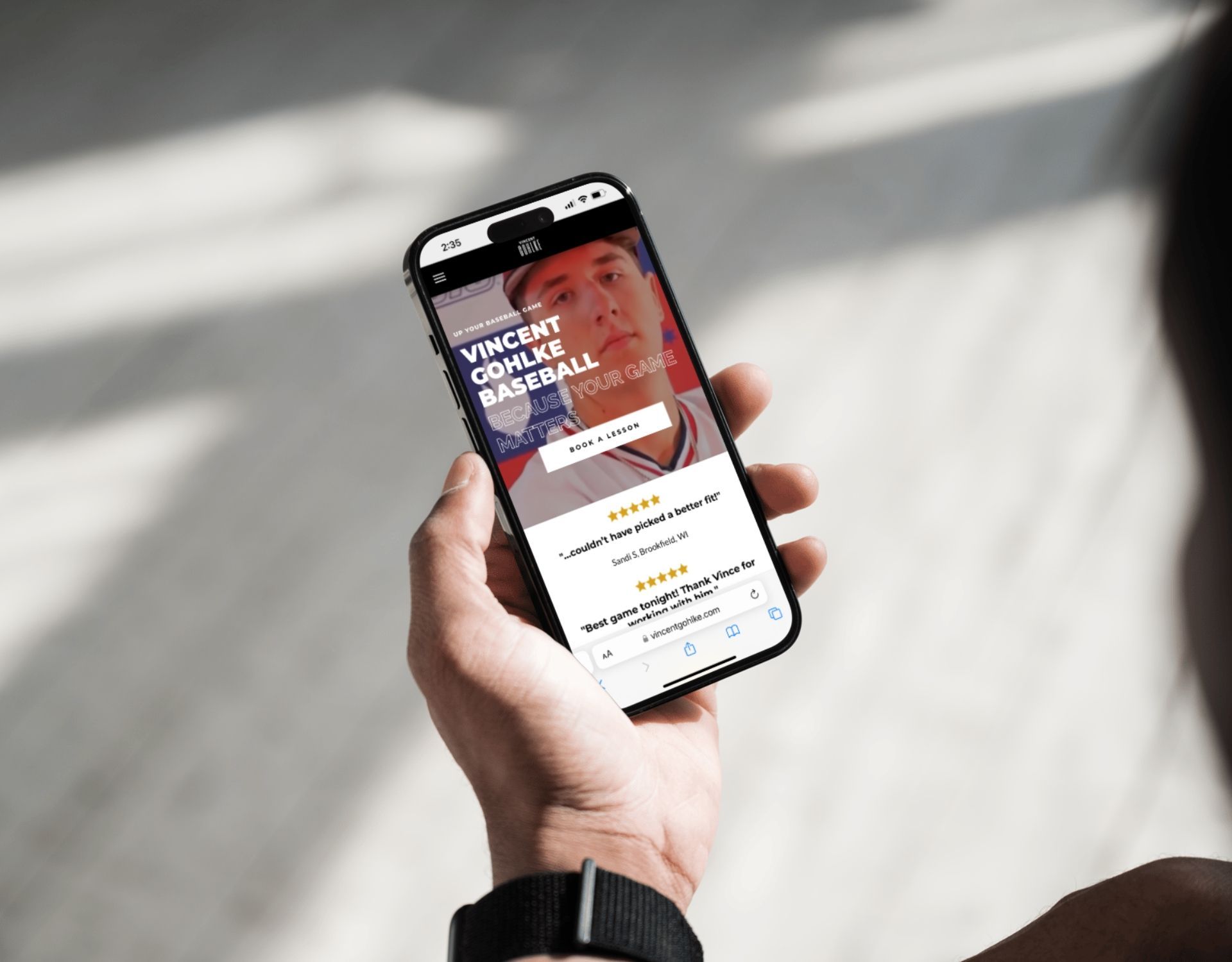A person is holding a cell phone in their hand.