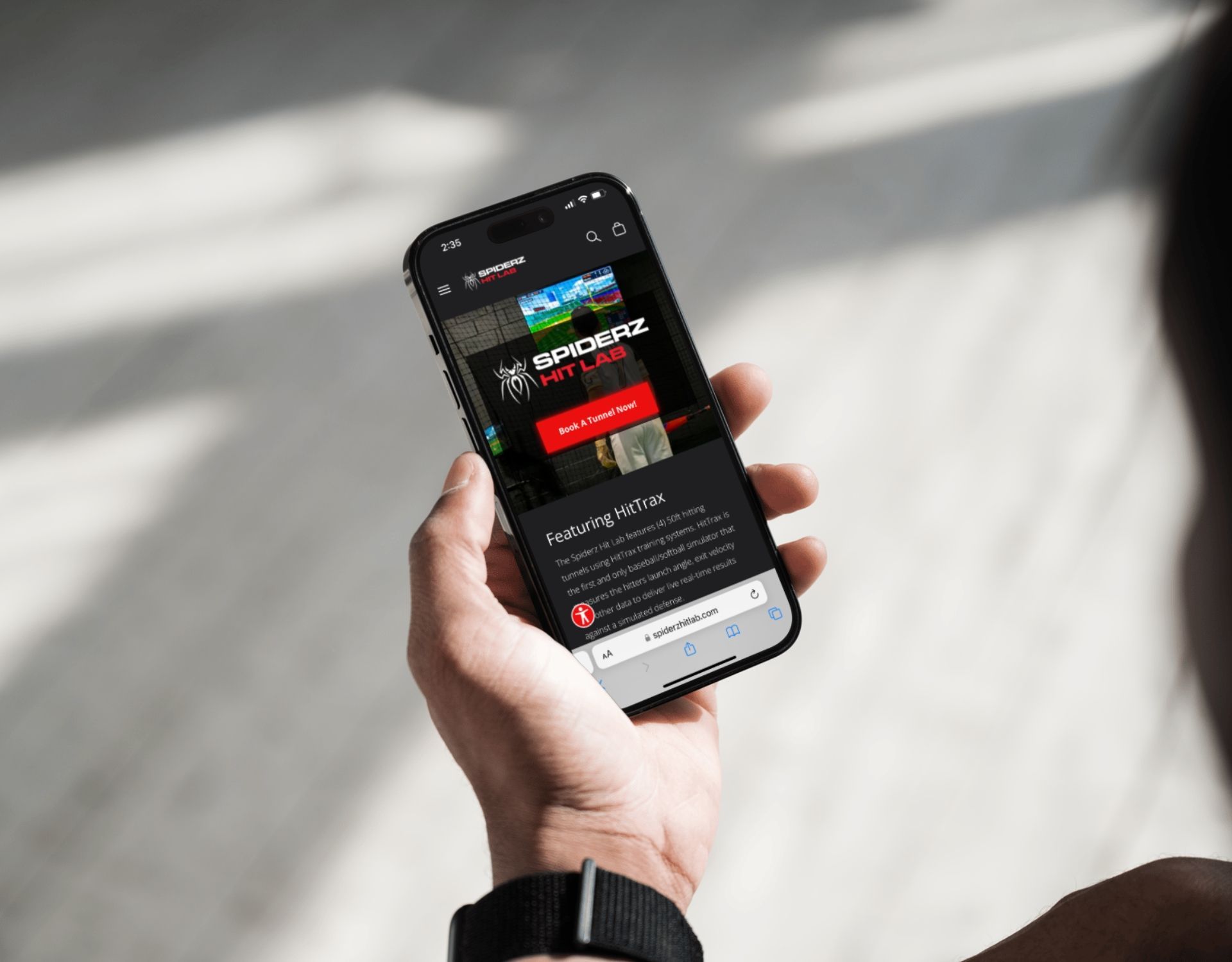 A person is holding a cell phone in their hand.