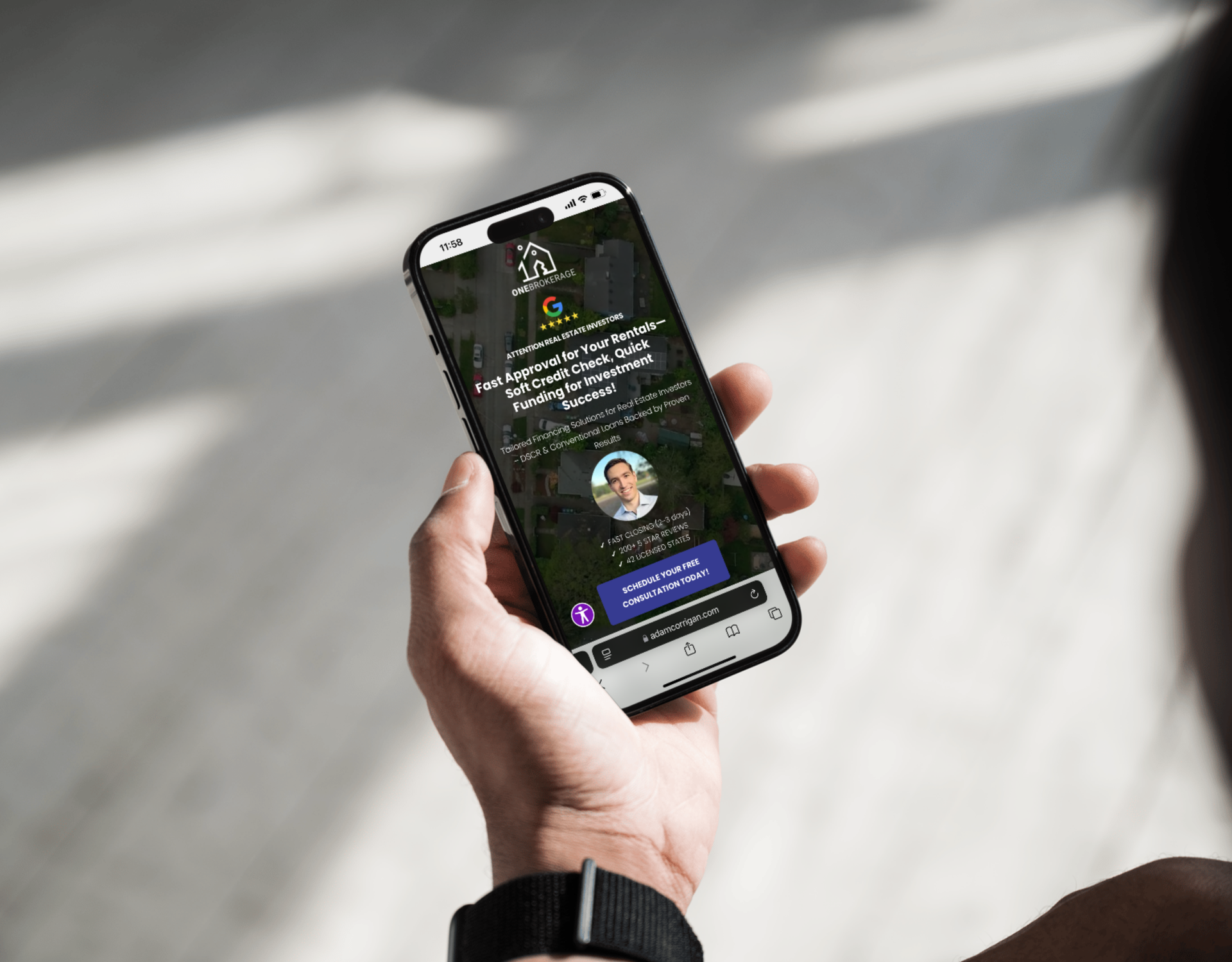 A person is holding a cell phone in their hand.