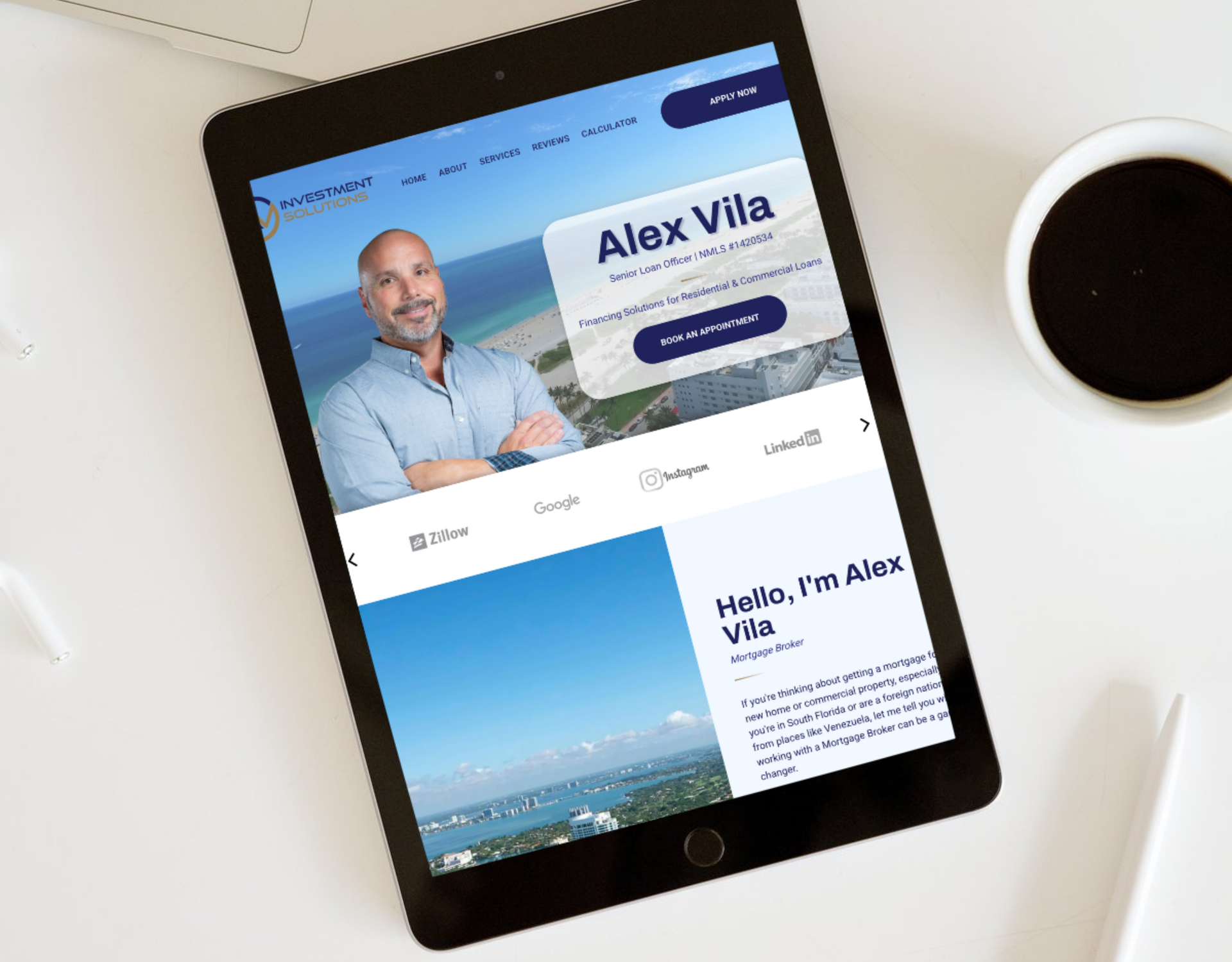 A tablet is sitting on a table next to a cup of coffee.
