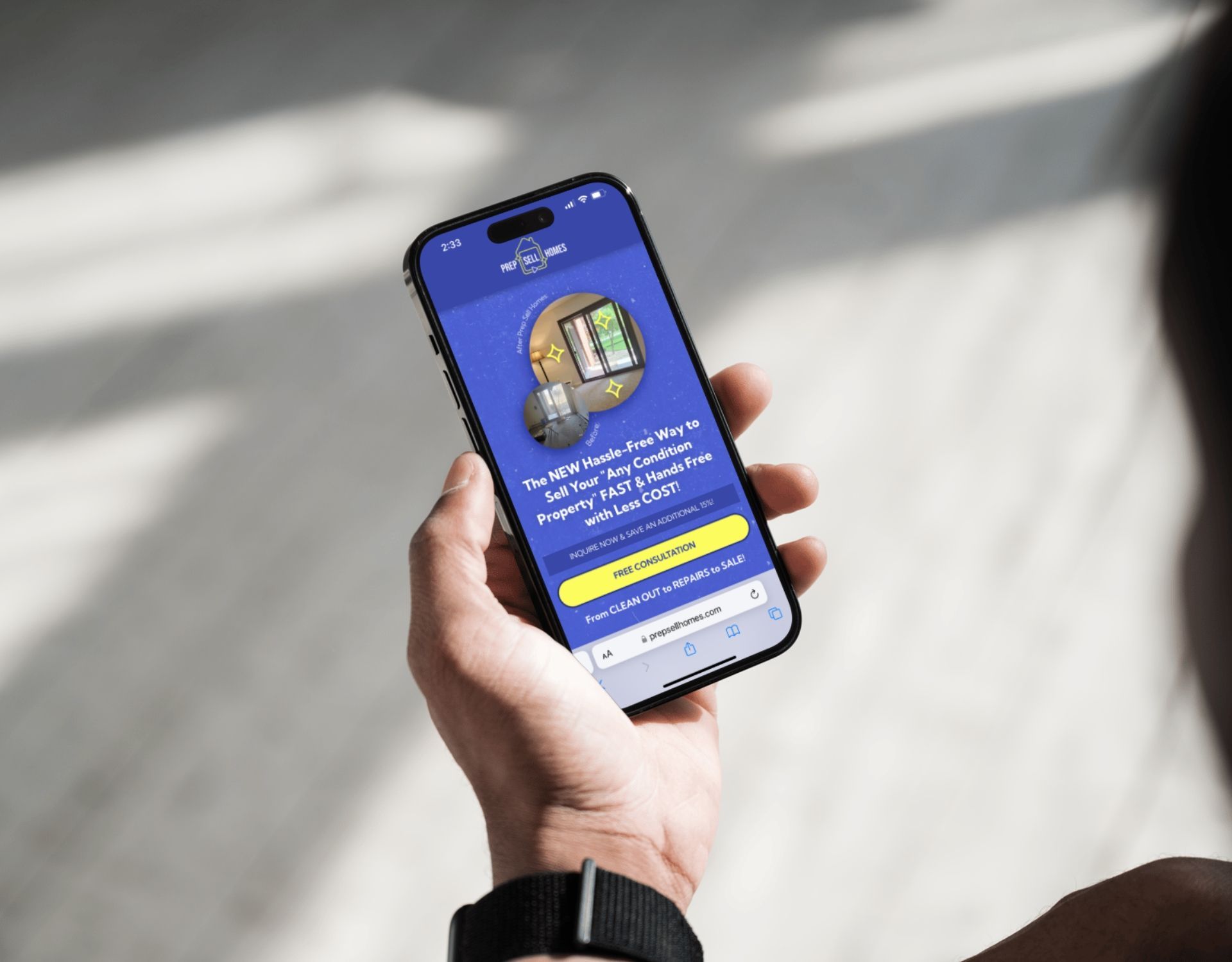 A person is holding a cell phone in their hand.