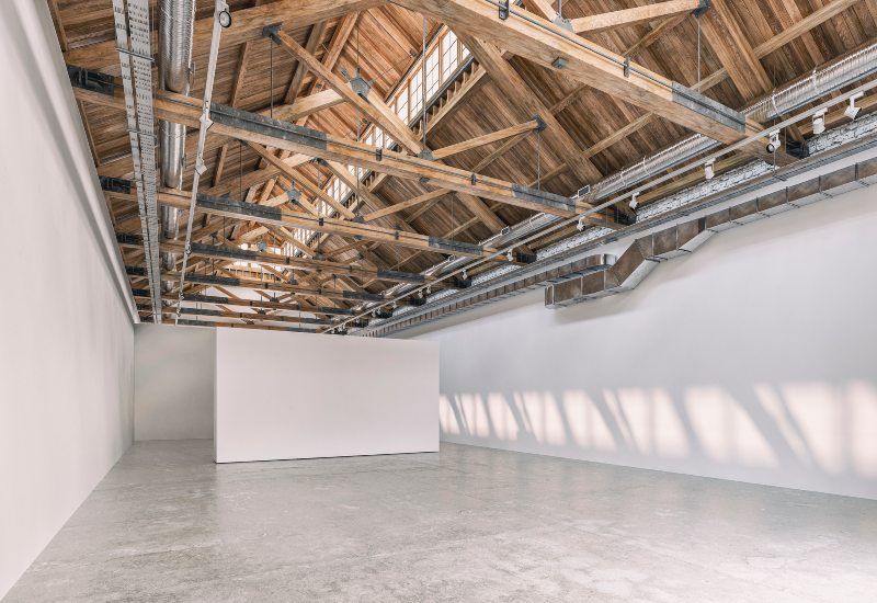Wooden bowstring trusses are ideal for wide interior spaces in Oshkosh & Milwaukee, WI