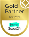 Gold-Partner-Abzeichen von ImmoScout24, gegründet 2022, mit einem türkisfarbenen und goldenen Design.
