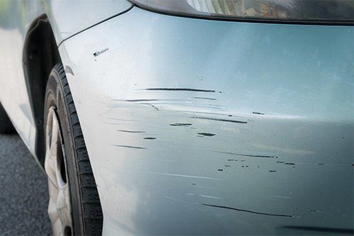 Deep Scratches on Car Bumper — Owensboro, KY — Cambron Body Shop Deep Scratches on Car Bumper — Owensboro, KY — Cambron Body Shop