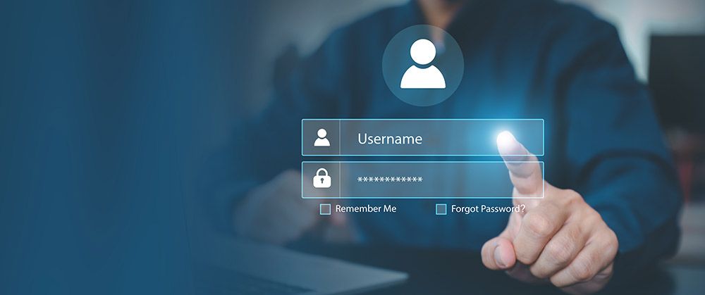 A person is pressing a button on a screen to enter their username and password.