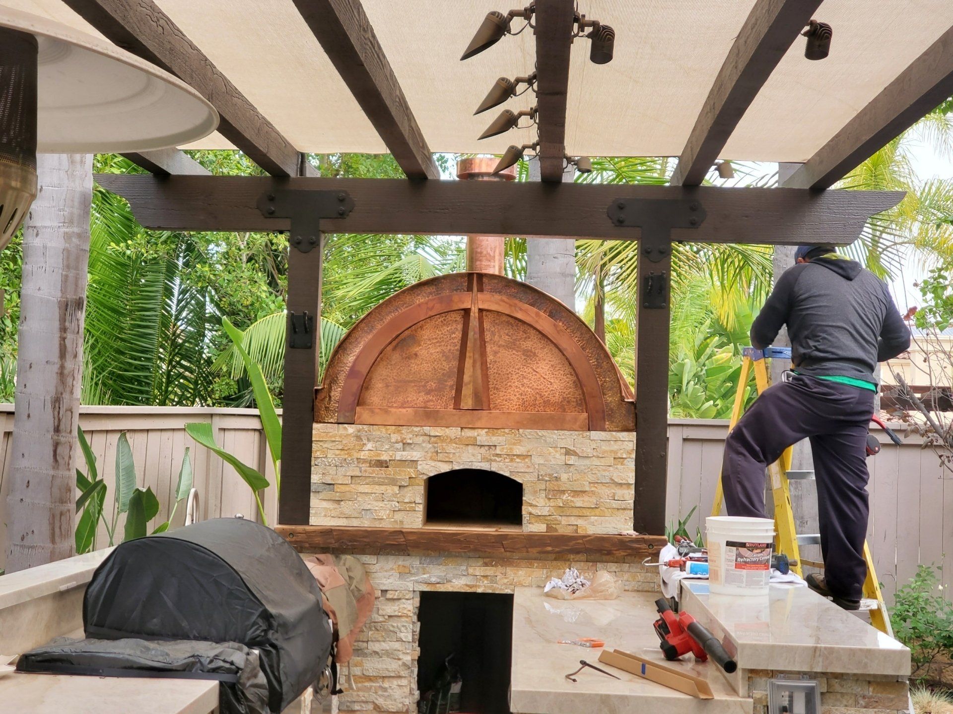 Man Working On A Pizza Oven Top — San Marcos, CA — Newest Sheet Metal