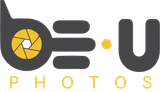 Logo for BEU Photos, gray with yellow accents: a camera lens integrated into the letters "BE" and a stylized "U."