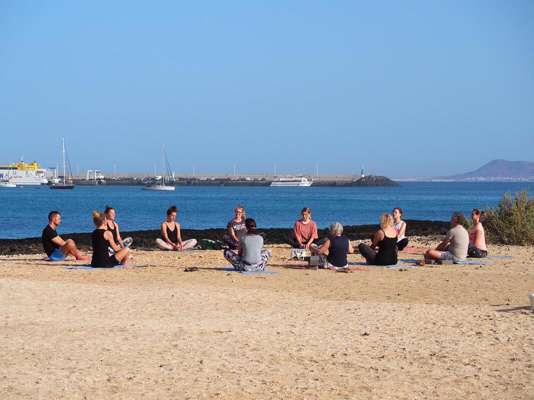 Beach yoga class in Corralejo