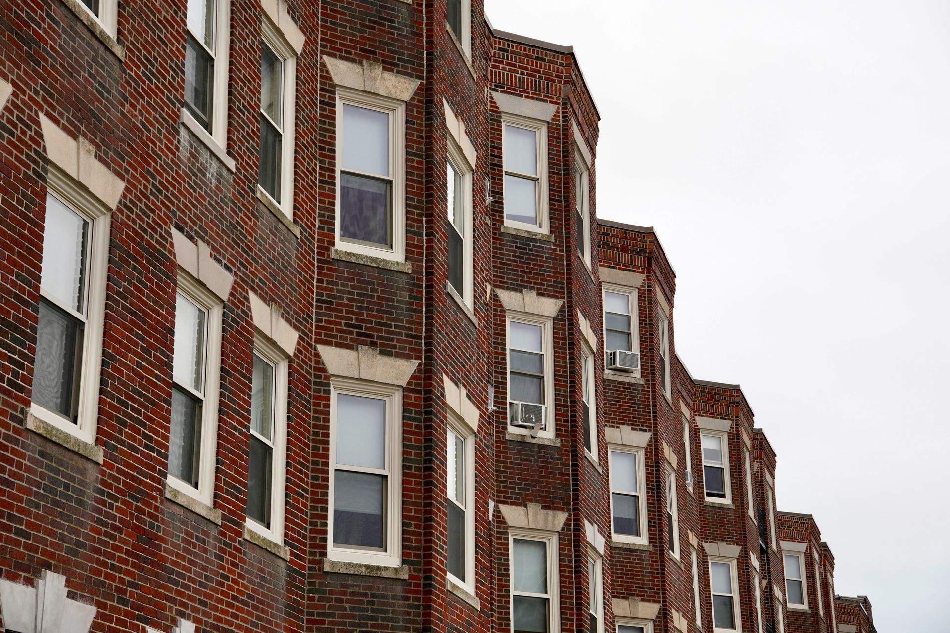 A housing project in Massachusetts, highlighting the assistance available in the state for financially struggling people.
