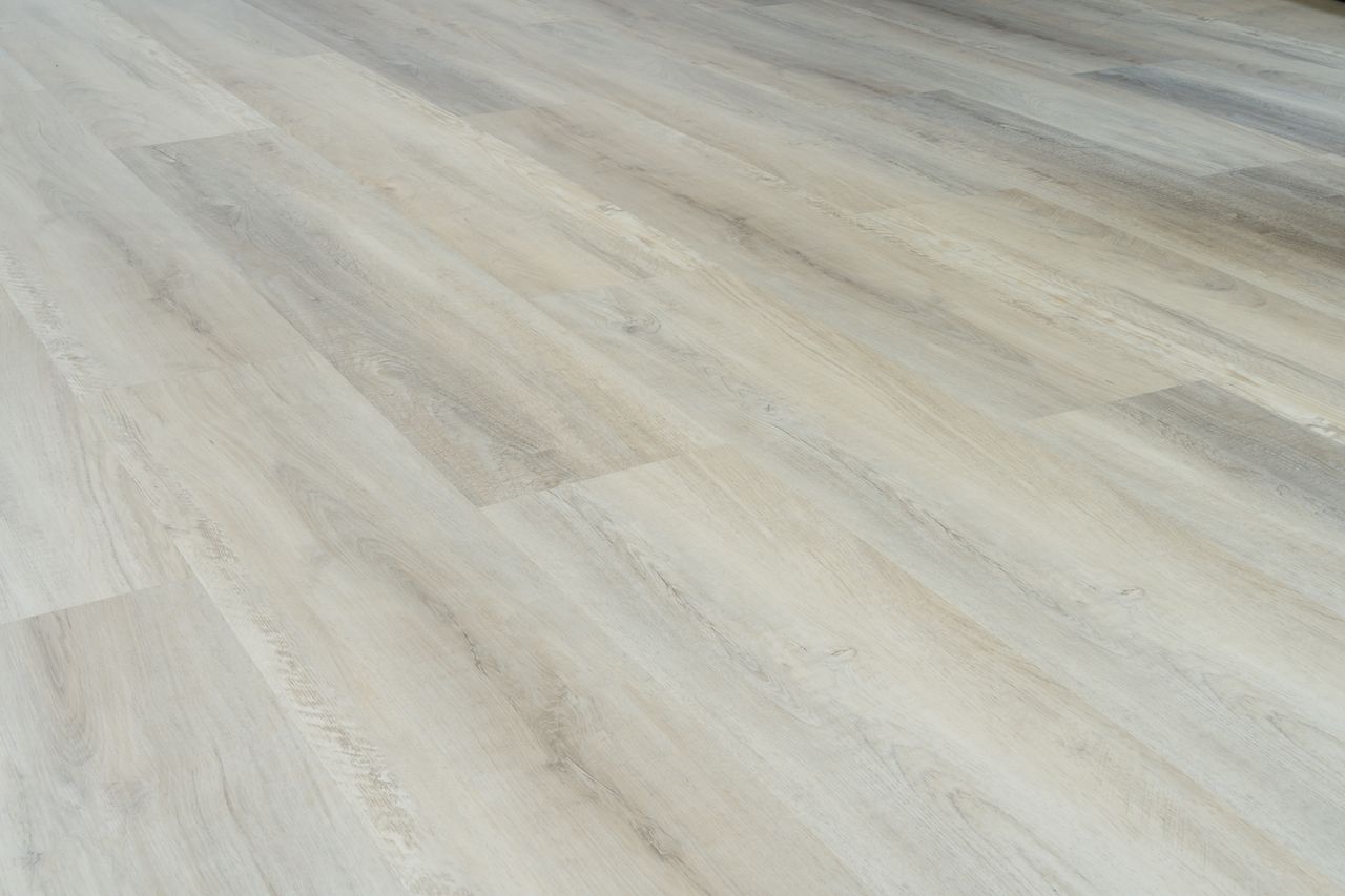 a close up of a white vinyl flooring in a room .