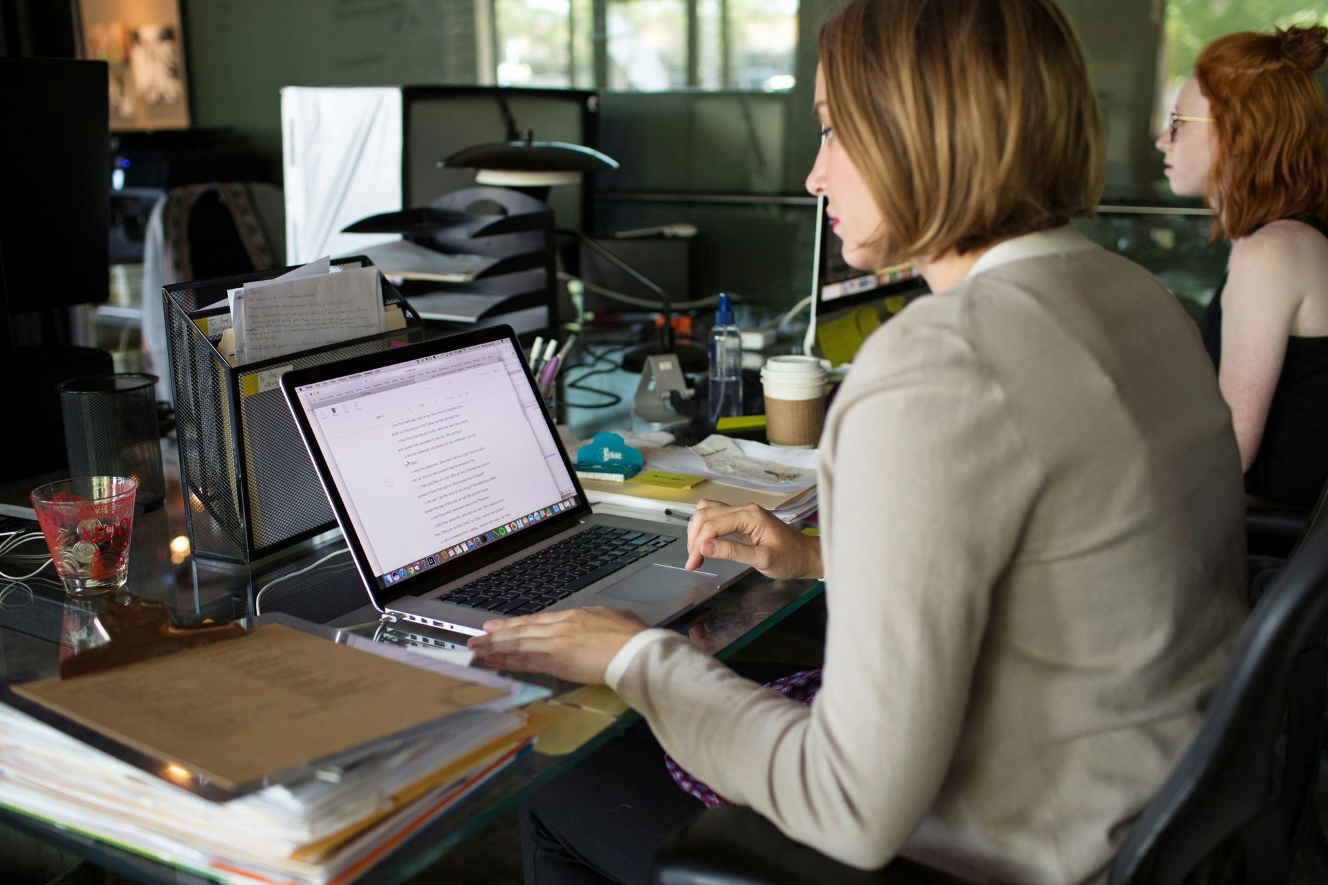 Brisbane legal recruitment in-house legal team members sitting at laptop