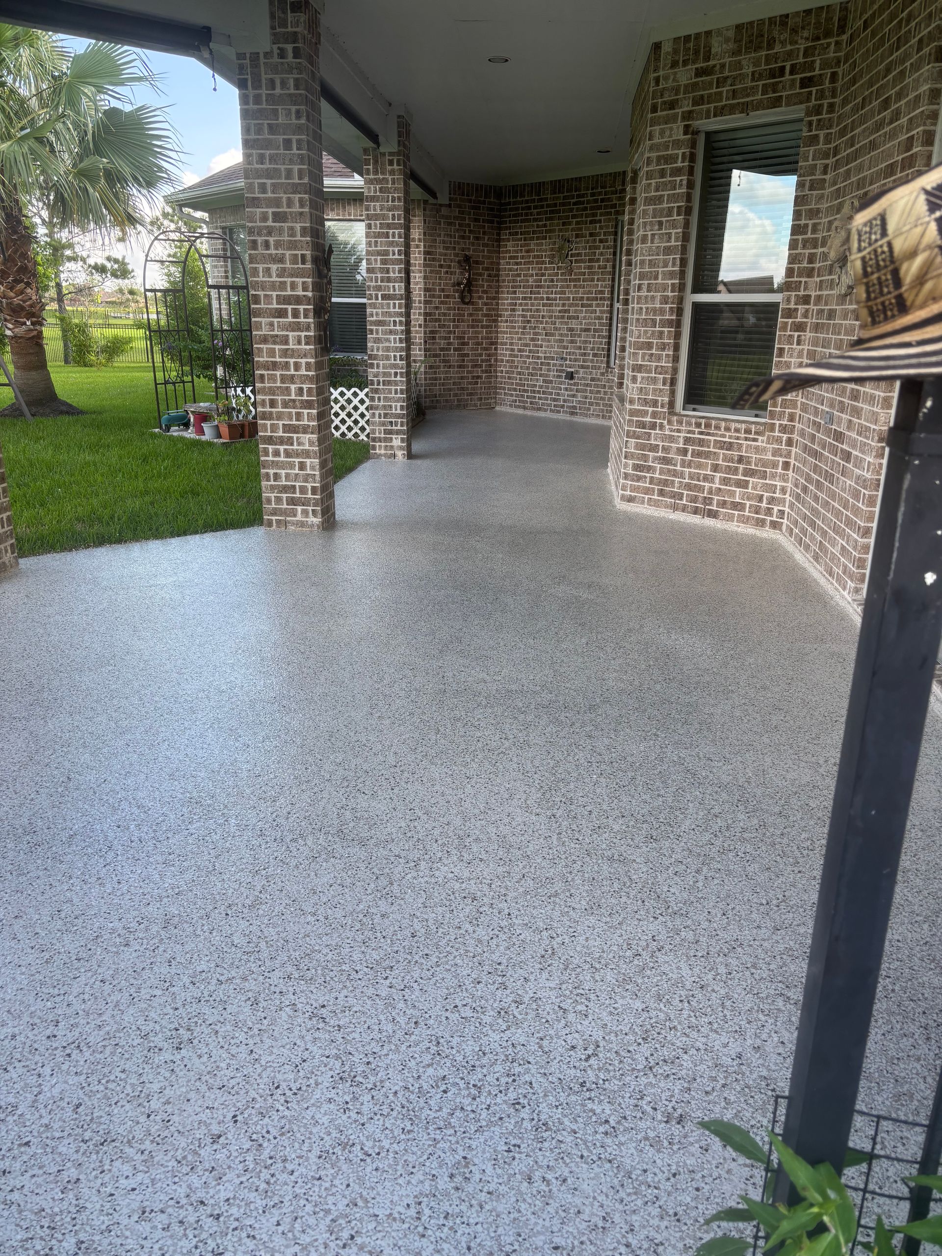 Concrete porch resurfacing with flake epoxy finish, Montgomery TX