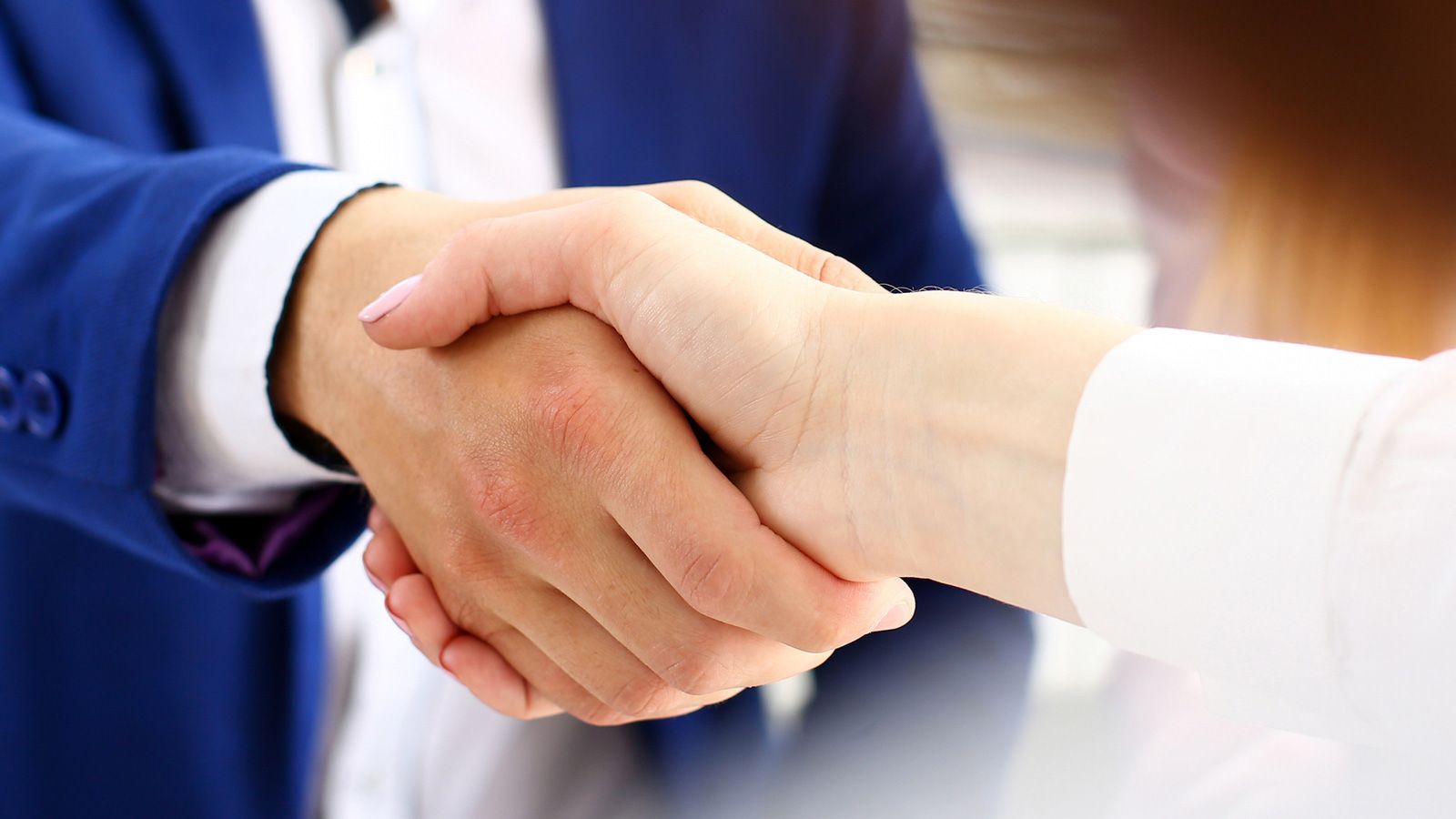 Attorney Shaking Hands To Client — Urbandale, IA — Flynn Law Firm, P.L.C.