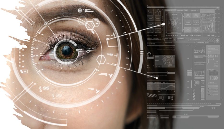 Close-up of an eye with a holographic interface overlaid, displaying data and graphics.
