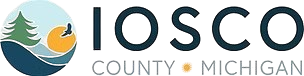 Iosco County of Michigan logo with stylized sun, trees, water, and fish in blue, green, and orange